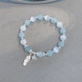 Korean style glass crystal bracelet with feather XingX blue moonlight colour and eight Awn star design