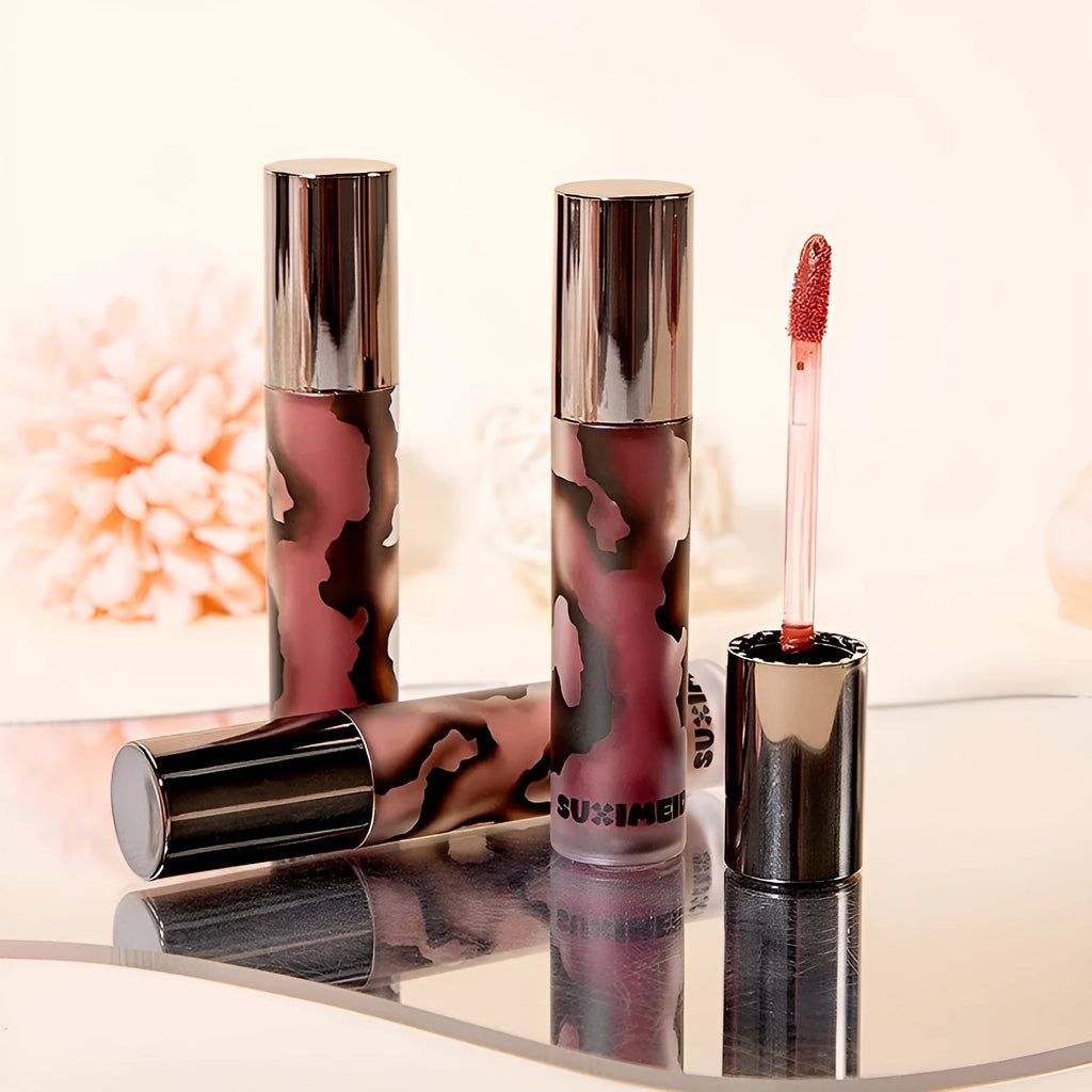 Lava Secret Matte Lip Mud Lipstick in five colours showing orange brown coffee, cool gray, cinnamon coffee, jujube red and smoked purple shades