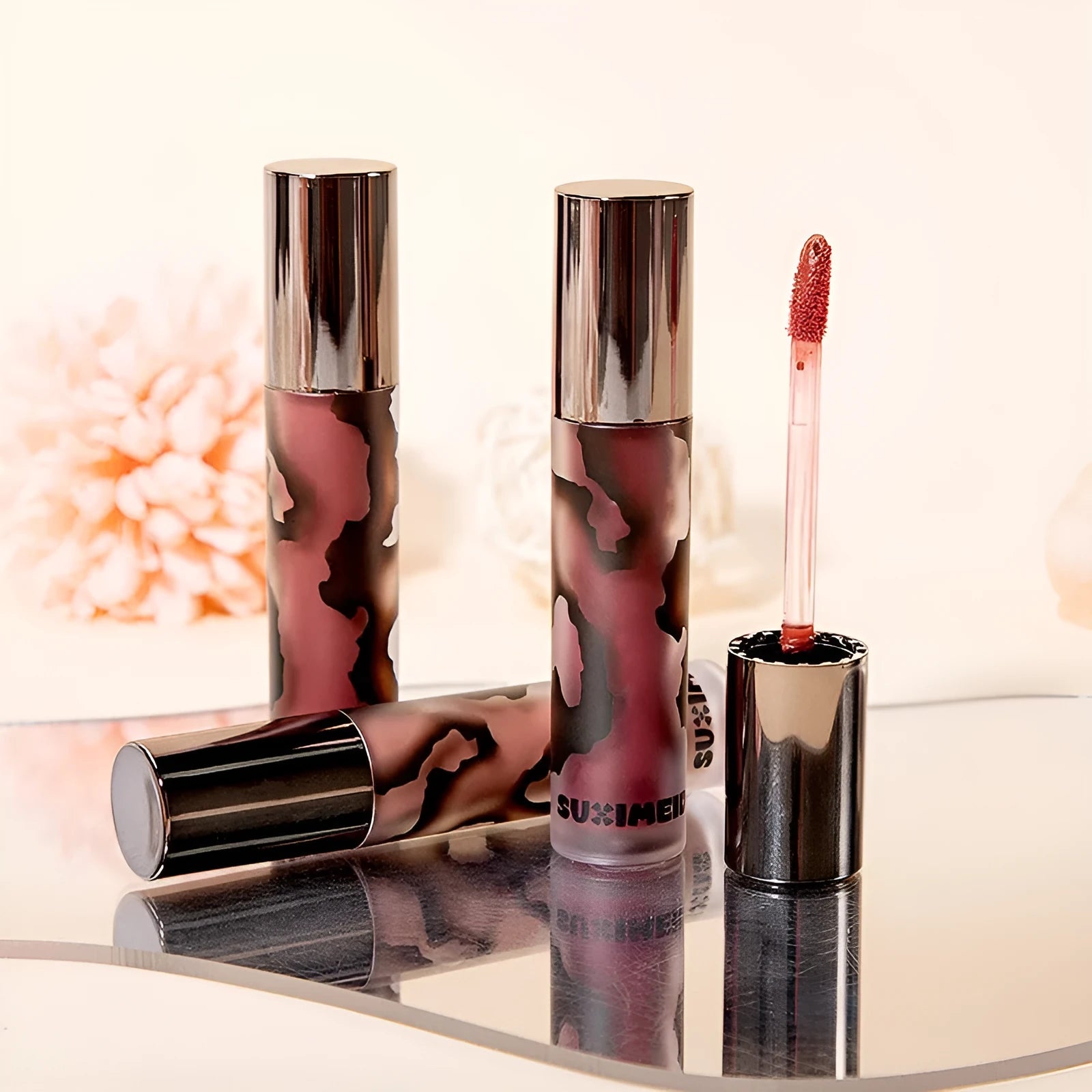 Lava Secret Matte Lip Mud Lipstick in five colours showing orange brown coffee, cool gray, cinnamon coffee, jujube red and smoked purple shades