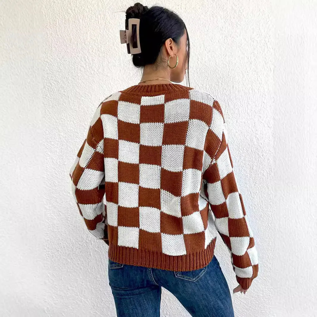 Dark brown women's plaid pullover sweater with long sleeves and a loose fit.