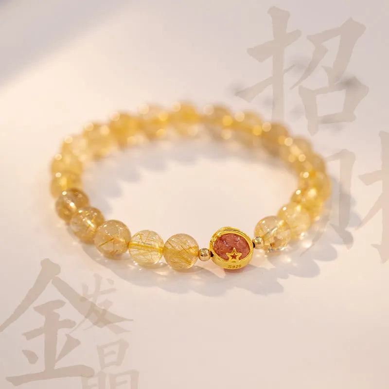 Gold rutilated quartz crystal bracelet with diamond-cut beads in 6mm and 8mm size options.