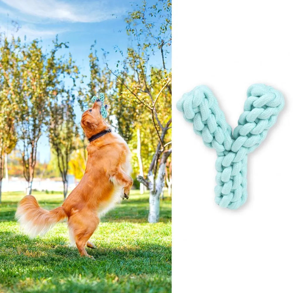 Blue Y-shaped cotton rope dog chew toy for large breeds on a wooden floor.