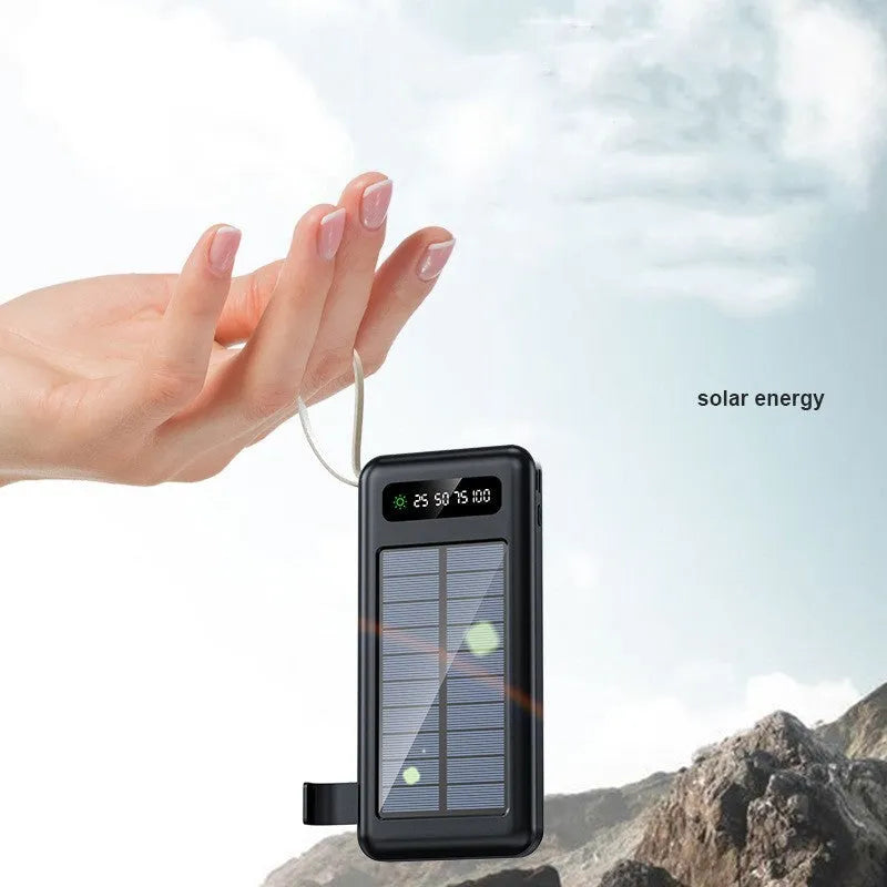 Solar power bank in black or white with capacity display and integrated solar panel.