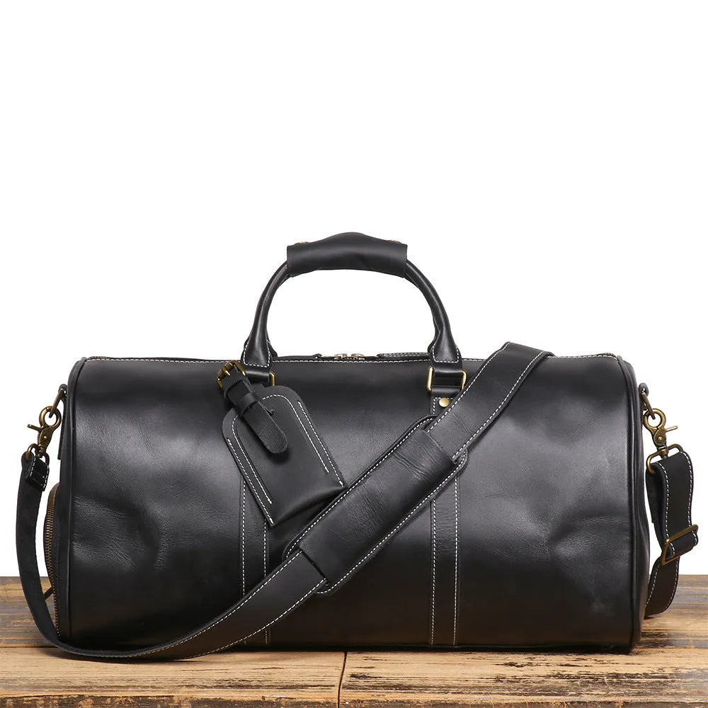 Men's genuine first layer cowhide leather travel bag in retro solid colour, available in black or dark brown, 50cm or 55cm