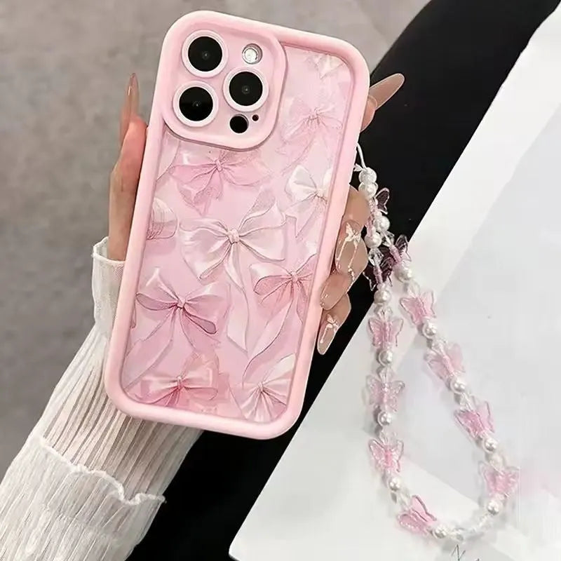 Pink matte silicone phone case with bow for iPhone 16