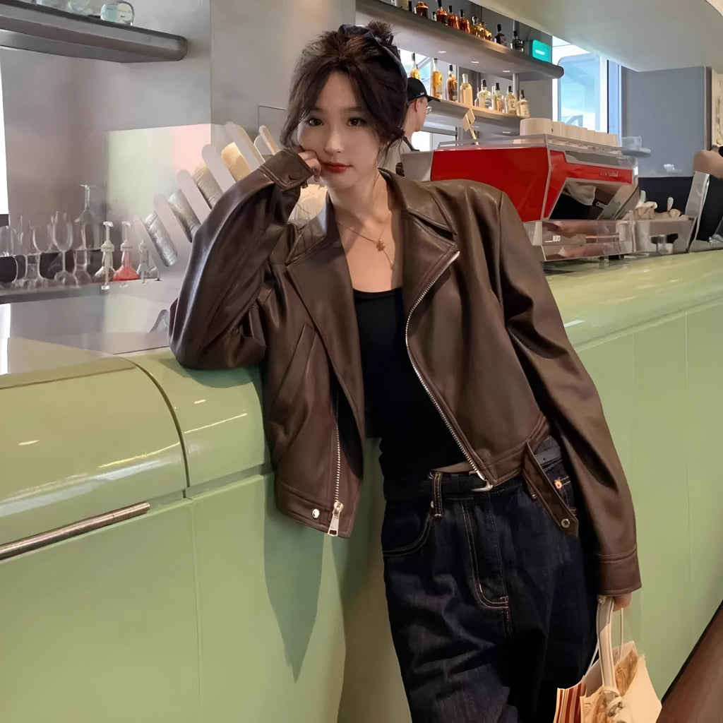 Women's slim-fit retro imitation leather jacket in black or brown with long sleeves and pockets
