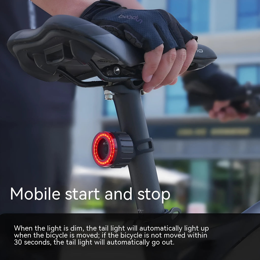 Black Intelligent Induction Brake Taillight for bicycles with seat tube bracket.