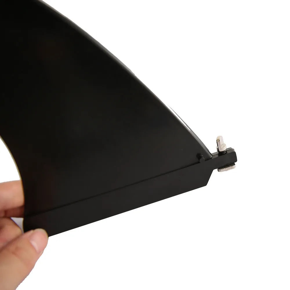 Plastic water dispenser paddle with large removable fish fins attached.