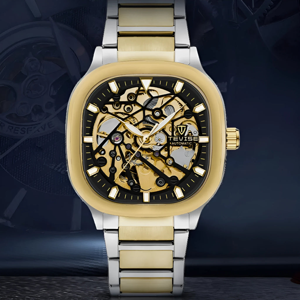 Men's square dial automatic watch with luminous markers and stainless steel strap on a wrist.