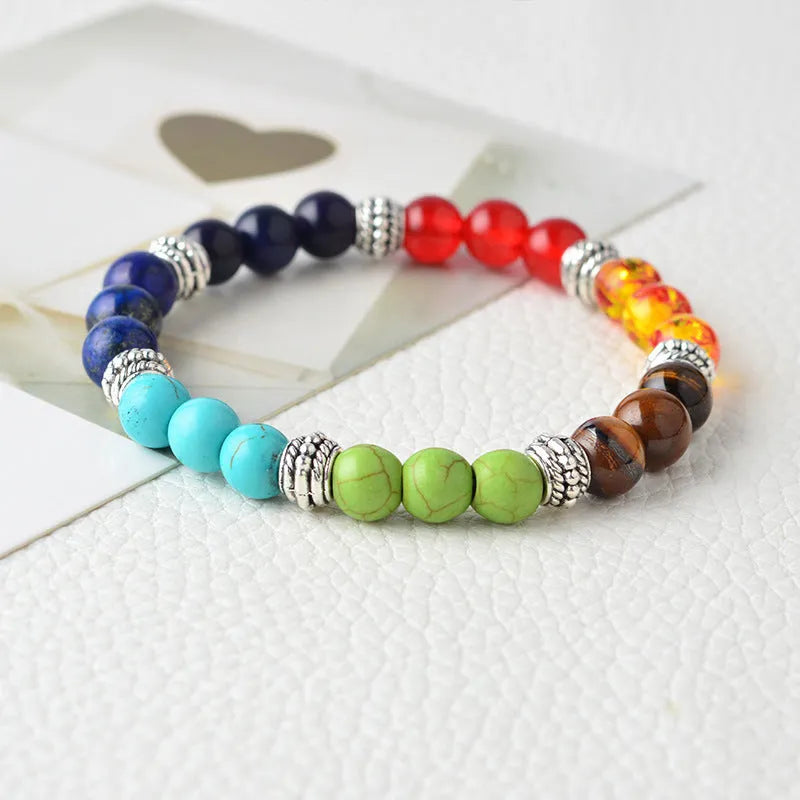 Natural stone colorful chakra energy yoga bracelet on wrist