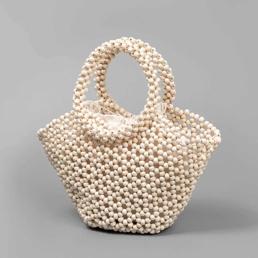 Maple wood hand-woven seaside handbag with wooden beads in dumpling shape