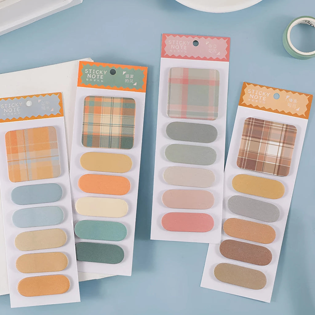 Set of six colourful plaid design memo pads with sticky notes, showing the 67mm by 200mm size.