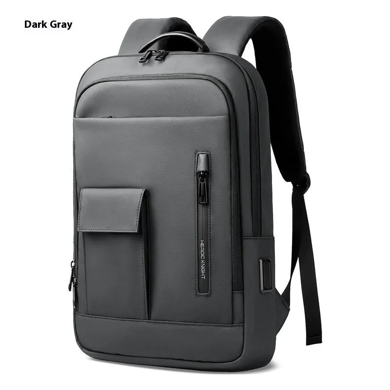 Men's lightweight Oxford cloth backpack in dark grey with sewing line detail.