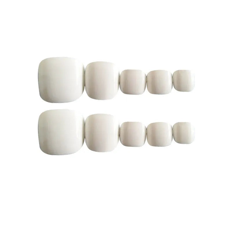 Set of solid colour false nails with Starry Sky pattern and pre-applied white glue for ladies.