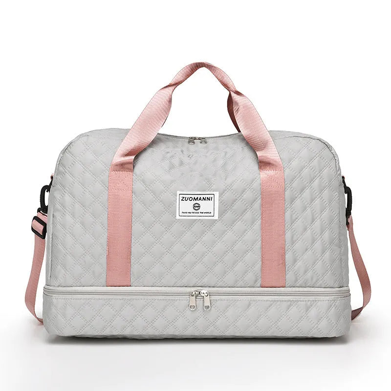 Large Oxford cloth travel holdall in a solid colour, shown with a capacity of 36-55 litres for buggies and luggage.