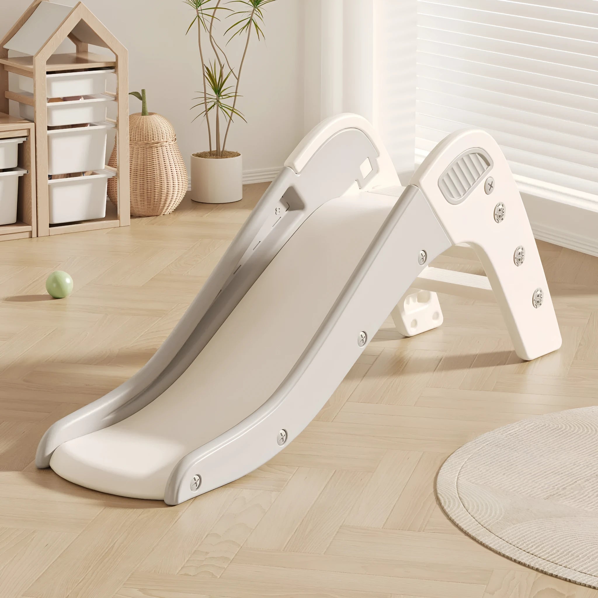 Small plastic baby slide for toddlers under three years in household setting