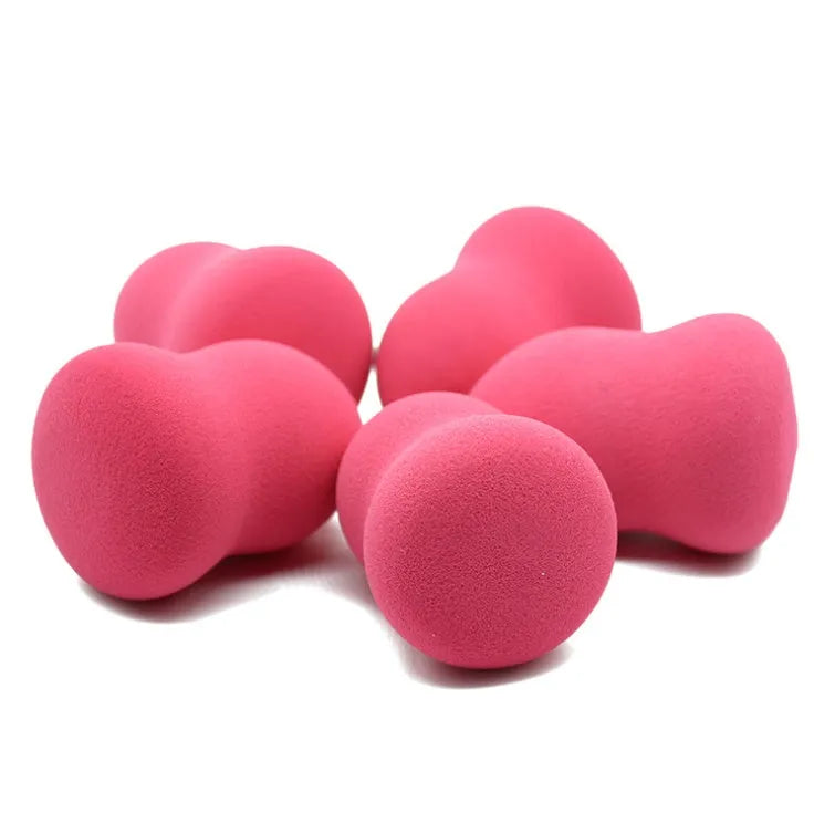 Pink cubic makeup foundation sponge with hydrophilic non-latex material for wet and dry use.