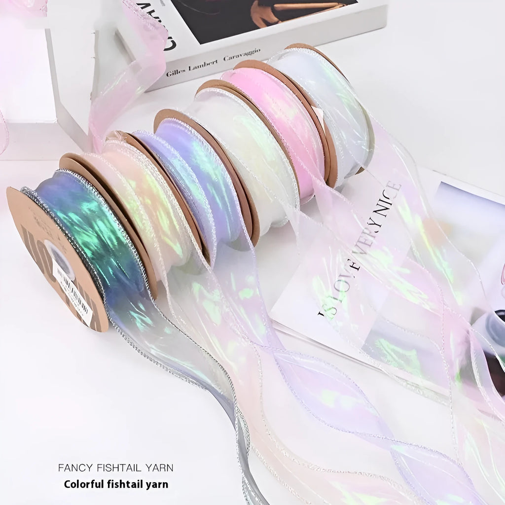 Roll of colourful fishtail yarn wave ribbon in mesh material, showing its textured, wave-like design.