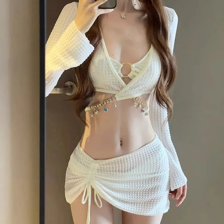 Women's long sleeve bikini swimsuit set in black or white polyester for swimming