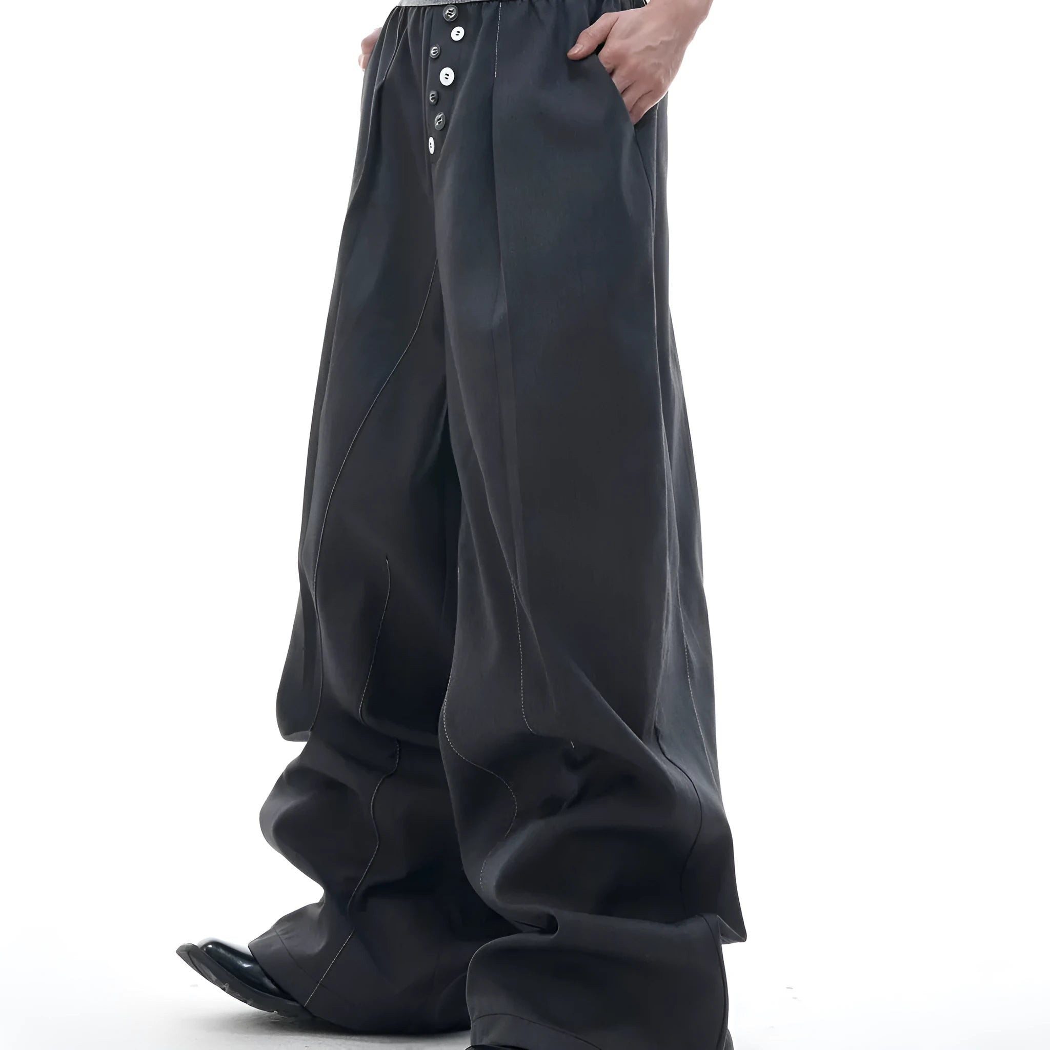 Straight-leg high-waist trousers with button front closure in black colour
