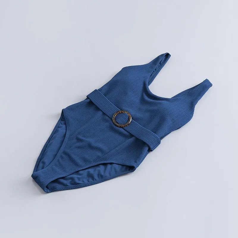 Navy blue solid colour one-piece swimsuit for women with a triangle style and built-in chest pad.
