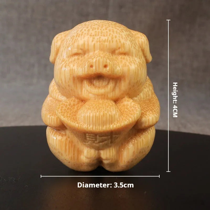 Fulu pig bamboo carving ornament measuring 4cm high with traditional Chinese motif