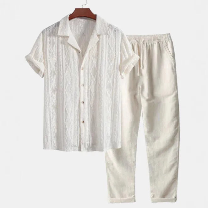 Slim-fit linen-polyester casual suit with camouflage print, showing short-sleeved cardigan shirt and matching trousers.