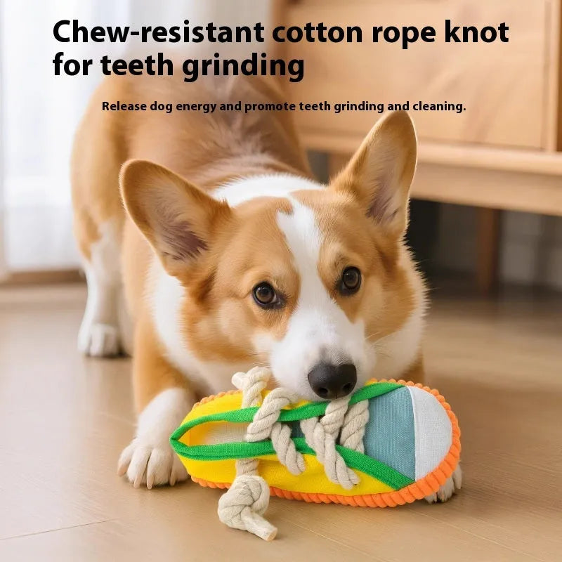 Plastic squeaky slipper-shaped dog chew toy in yellow, black, or blue.