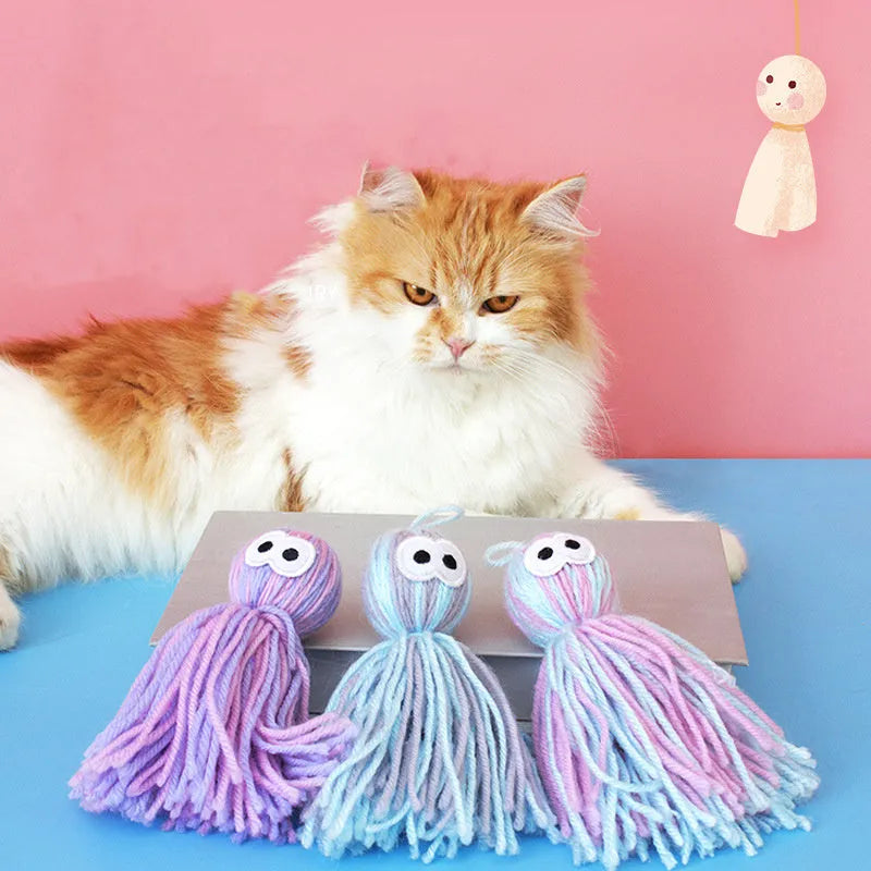 Cat toy set with wool ball, hanging attachment, and teaser stick in blue-gray colour combination
