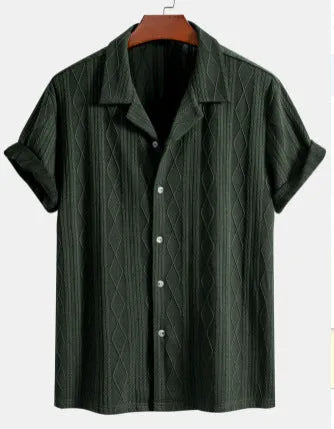 Man wearing a loose black polyester cardigan with short sleeves.