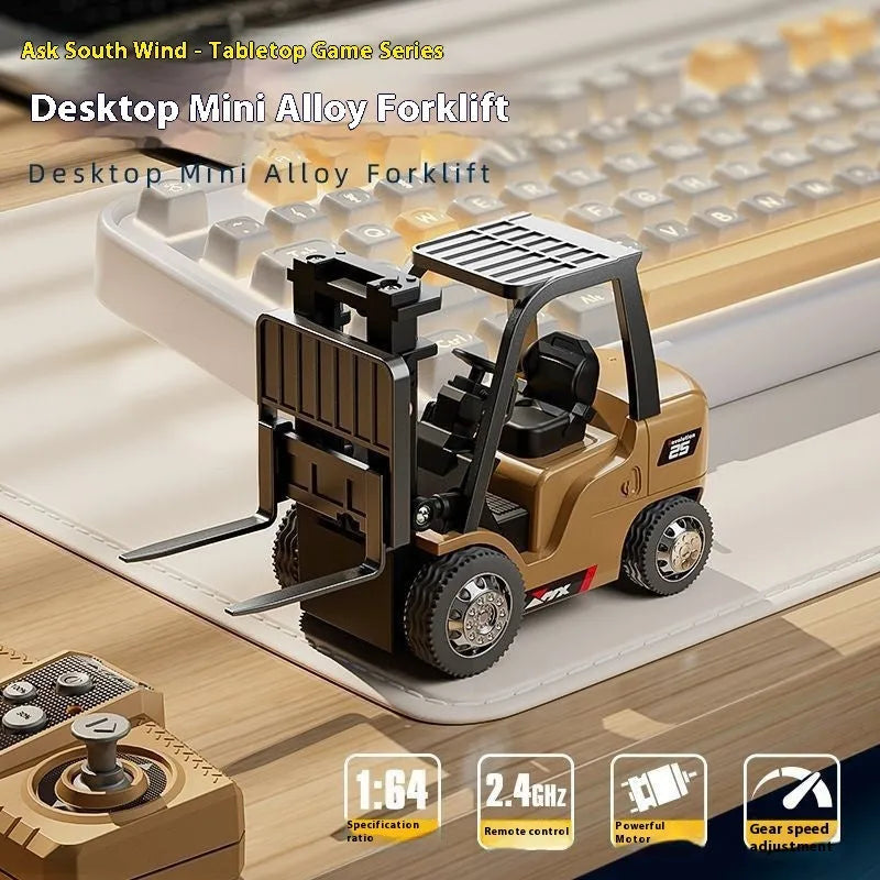 Miniature silver alloy remote control forklift toy with cargo hook on a pallet.