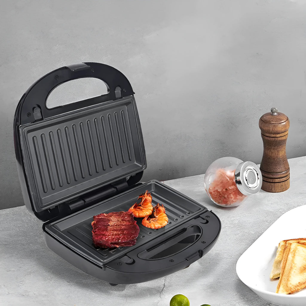 Black double-sided electric sandwich maker with stainless steel lid and six round non-stick cooking plates.