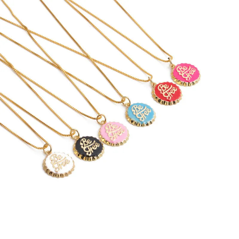 Gold plated bottle cap pendant on a copper chain necklace in multiple colour options.