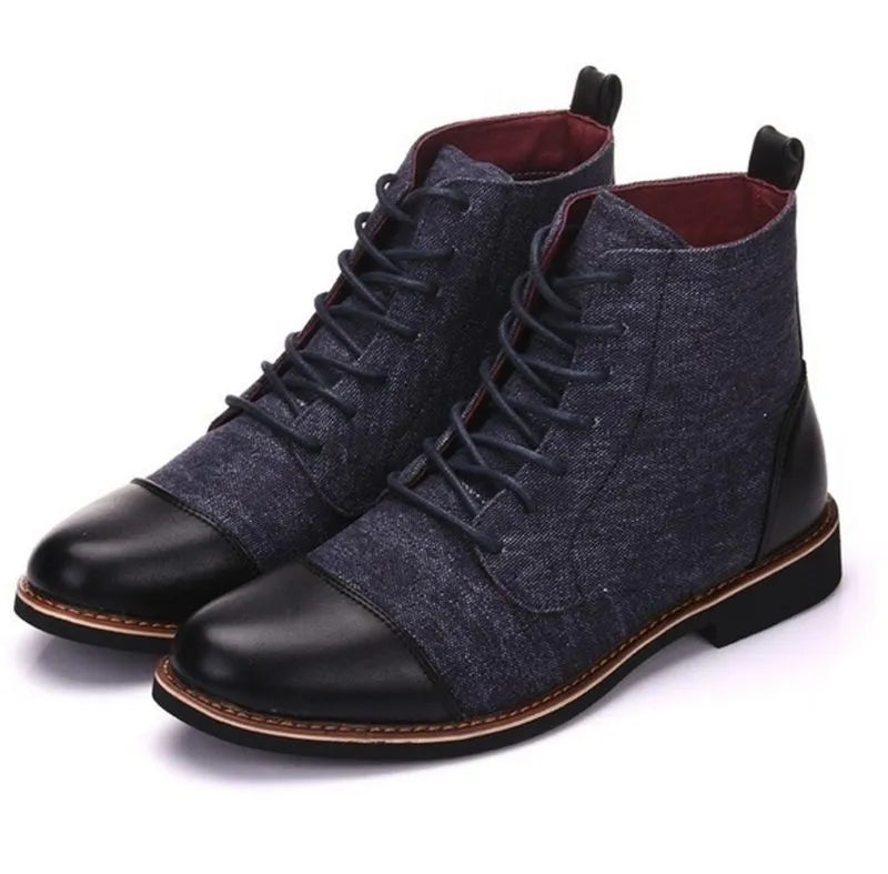 Men's black leather motorcycle boots with silver belt buckle detailing on the shaft.