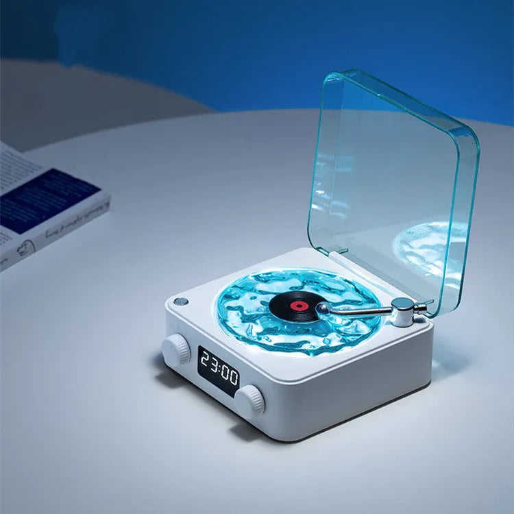 Blue retro turntable Bluetooth speaker with rotating disc and RGB light projection