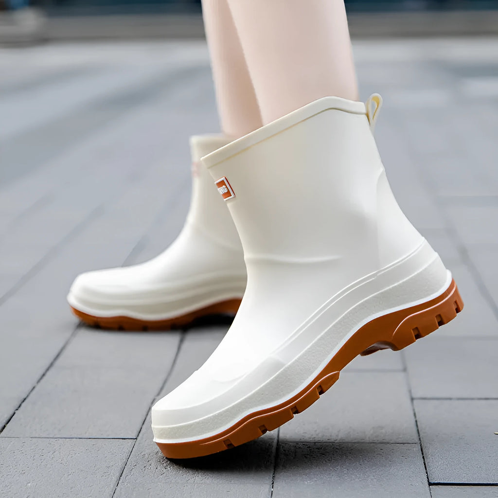 Women's short waterproof non-slip rubber shoes in white, black, and pink colours
