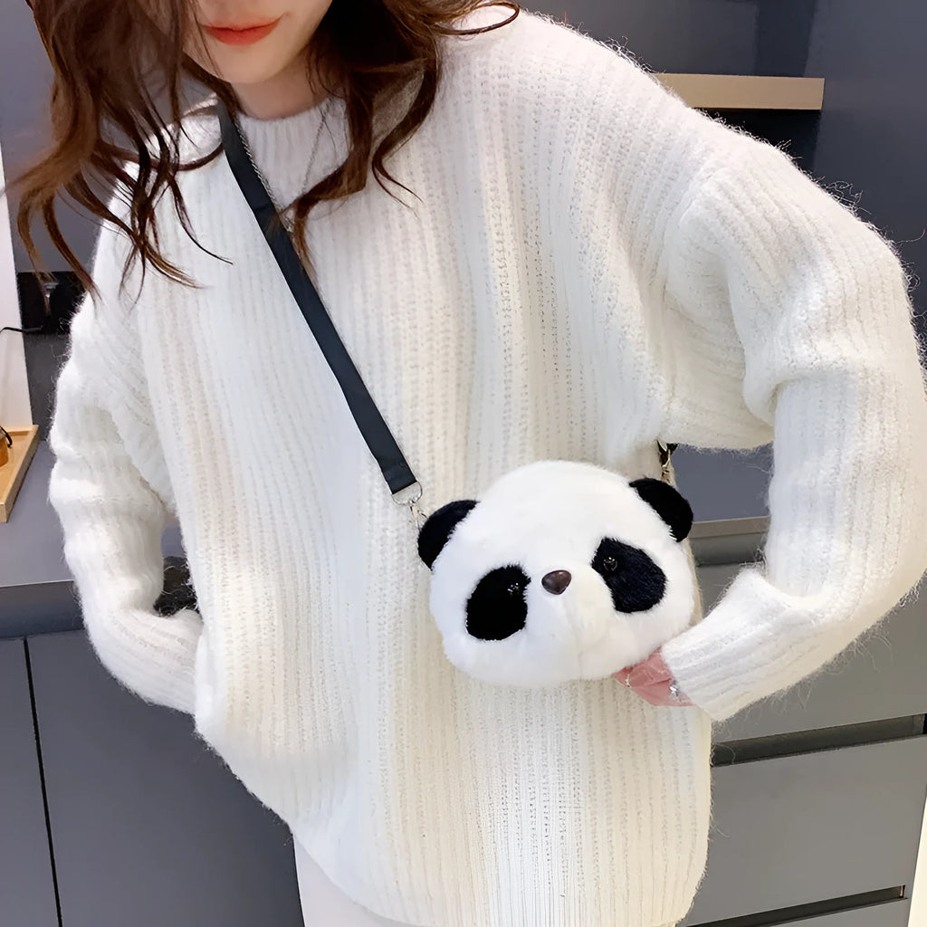 Soft plush crossbody bag with panda head design, shown in cylindrical shape.