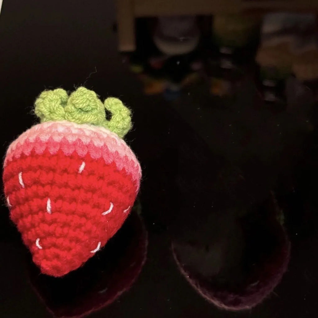 Soft plush strawberry pendant keychain in pink and red colour options with metal ring