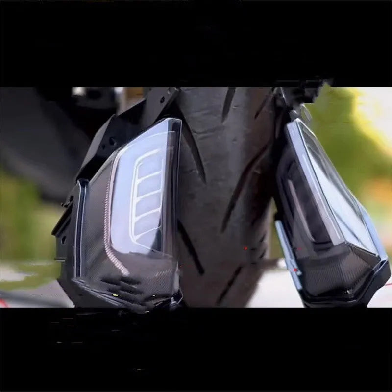 Pair of LED steering turn signal lights for Yamaha NMAX155 scooter on a white background.