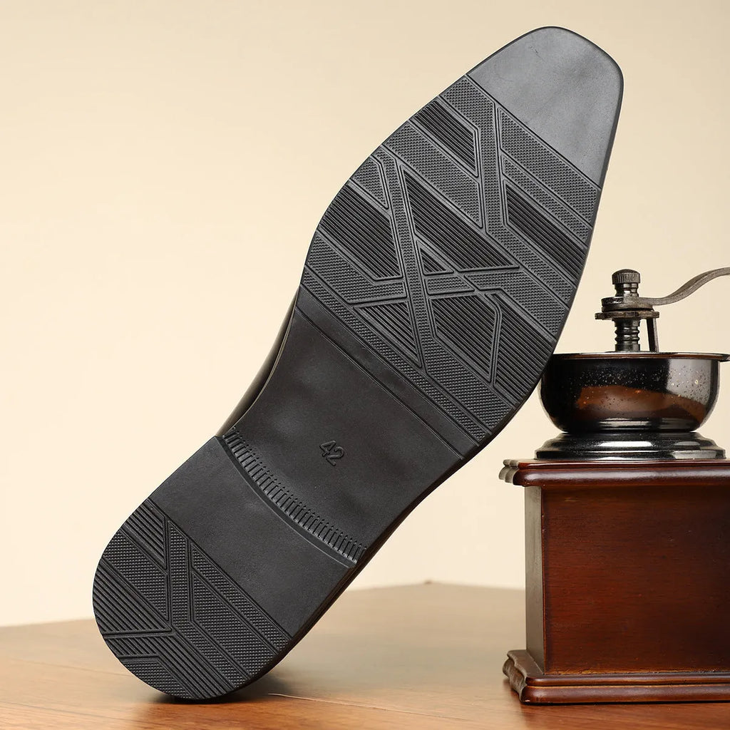 Men's brown retro formal shoes with side zipper and square toe on a plain background.