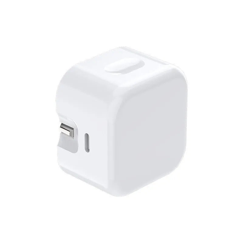 White 20W USB-C Power Delivery fast charger with British plug and coiled USB-C cable.