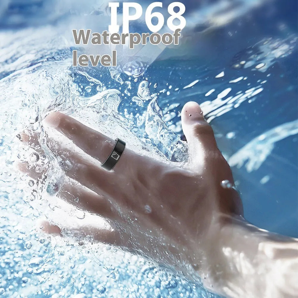 Black ceramic smart ring for health monitoring on a finger, showing a charging case nearby.