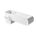 White plastic kitchen knife storage block with modern simple design on countertop