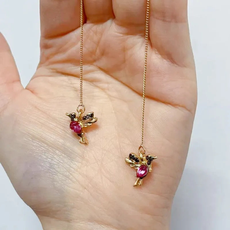 Personalised long drop earrings with bird charm and zirconium wing accents in electroplated colours