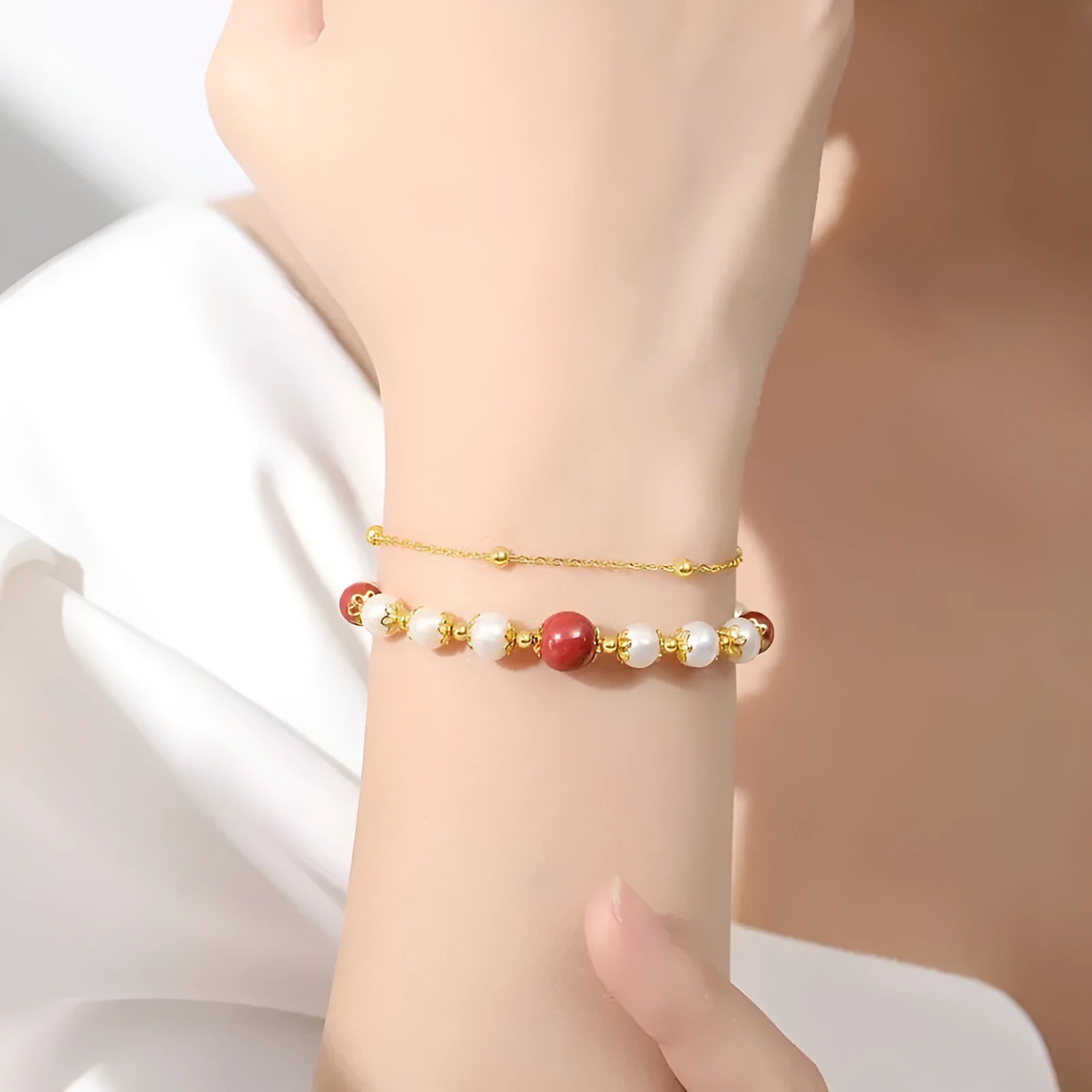 Sterling silver double-layer bracelet with cinnabar red beans and freshwater pearls in geometric design