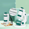 Portable plastic microscope with specimen slides in white-green colour scheme
