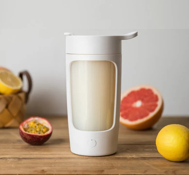 Portable automatic blending cup with lid, shown in available colours with 650ml capacity marking