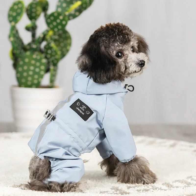 Blue waterproof hooded reflective raincoat for dogs on a white background