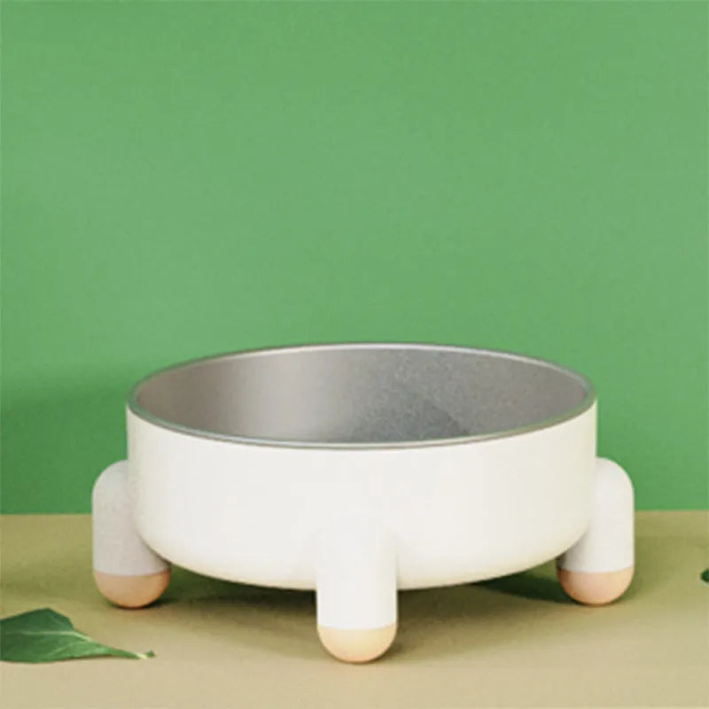 Green stainless steel pet food bowl with high foot and non-slip anti-overturn base.