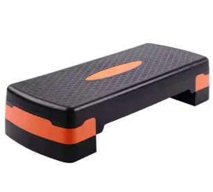 Grey Fit Step aerobics platform for fitness training on a floor.
